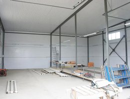 Гаражный бокс для грузового авто на 2 машиноместа (150 кв.м.) из сэндвич-панелей, построенная компанией Альянс - Гаражный бокс для грузового авто на 2 машиноместа (150 кв.м.), д. Усть-Цильма, респ.Коми